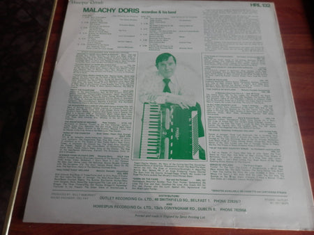Malachy Doris Accordion & His Band* : Dancing Thro' Irelands Hit Parade (LP)