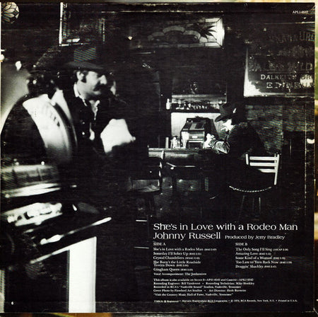 Johnny Russell (2) : She's In Love With A Rodeo Man (LP, Album)