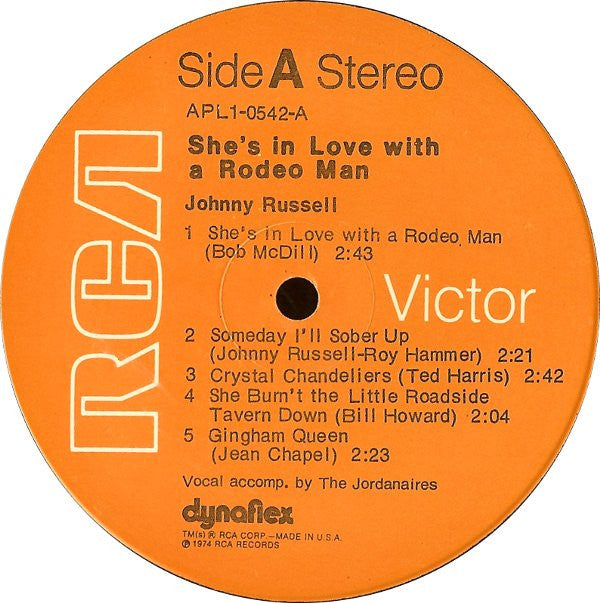 Johnny Russell (2) : She's In Love With A Rodeo Man (LP, Album)