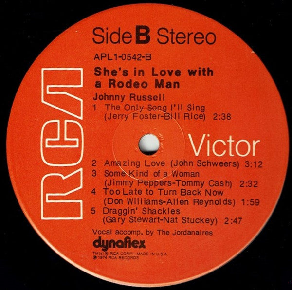 Johnny Russell (2) : She's In Love With A Rodeo Man (LP, Album)