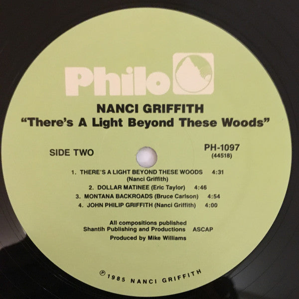 Nanci Griffith : There's A Light Beyond These Woods (LP, Album, RE)