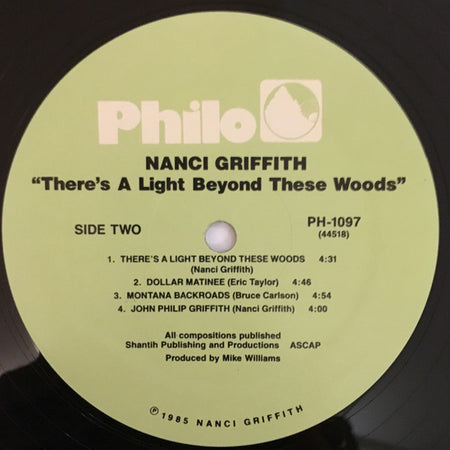 Nanci Griffith : There's A Light Beyond These Woods (LP, Album, RE)