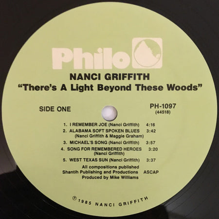 Nanci Griffith : There's A Light Beyond These Woods (LP, Album, RE)